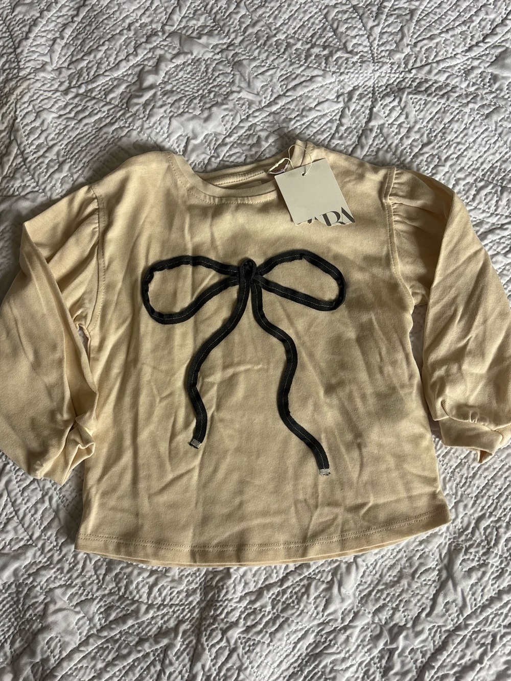 NWT A Bow Makes the Day Better Zara Cream Long Sleeve Top Black Bow Appliqué